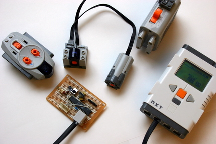 The AVR-based IR link with the Power-Functions components and the NXT